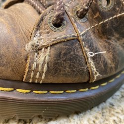 Evan's Shoe Repair - He didn't cinch down the knot or secure the stitching in any way. It's failing again after less than a day.