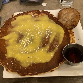 Crave Kitchen and Bar - 3 pancakes bigger than my face! Blueberry pancakes with lemon curd - yum! I couldn't even eat one whole pancake! - New American Near Me - El Paso, Texas