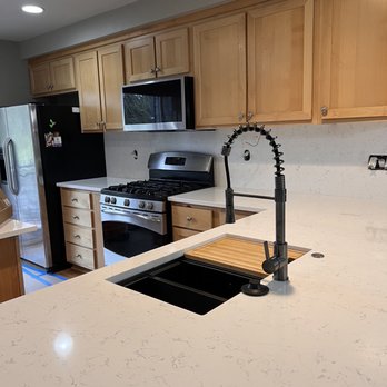 Wise Choice Construction - New sink, complete with button for disposal. This required some rewiring. - General Contractors Near Me - Renton, Washington Wise Choice Construction - New sink, complete with button for disposal. This required some rewiring. - General Contractors Near Me - Renton, Washington