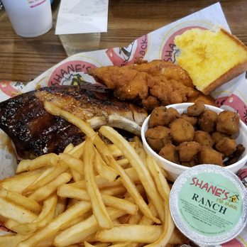 Shane's Rib Shack - I usually just get boneless wings but during my recent trip, I got the sampler which included ribs, pulled pork, fries, tenders, and a side. - Barbeque Near Me - Perry, Georgia Shane's Rib Shack - I usually just get boneless wings but during my recent trip, I got the sampler which included ribs, pulled pork, fries, tenders, and a side. - Barbeque Near Me - Perry, Georgia