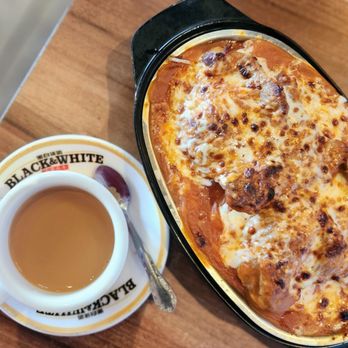 The Flame Cafe - 112. Hong Kong Style Milk Tea  401. Baked Pork Chop in Tomato Sauce - Hong Kong Style Cafe Near Me - Sacramento, California