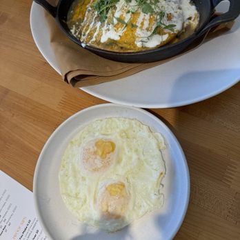 Yolked Kitchen - New Mexican Green Chile Enchiladas with eggs on side - Breakfast & Brunch Near Me - Clovis, California Yolked Kitchen - New Mexican Green Chile Enchiladas with eggs on side - Breakfast & Brunch Near Me - Clovis, California