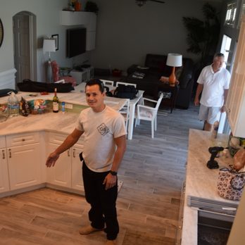 GB Tile Of Florida - a man standing in a kitchen - Flooring Near Me - Pompano Beach, Florida GB Tile Of Florida - a man standing in a kitchen - Flooring Near Me - Pompano Beach, Florida