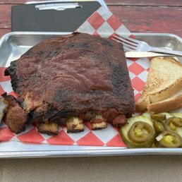 Half rack of smoked pork ribs