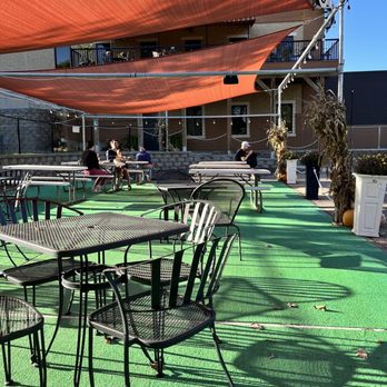 OMNI Brewery & Taproom - a patio with tables and chairs - Breweries Near Me - Victoria, Minnesota OMNI Brewery & Taproom - a patio with tables and chairs - Breweries Near Me - Victoria, Minnesota