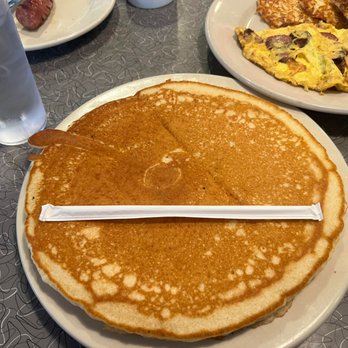 Totin's Diner - a stack of pancakes with a knife sticking out of it - Diners Near Me - Wexford, Pennsylvania Totin's Diner - a stack of pancakes with a knife sticking out of it - Diners Near Me - Wexford, Pennsylvania