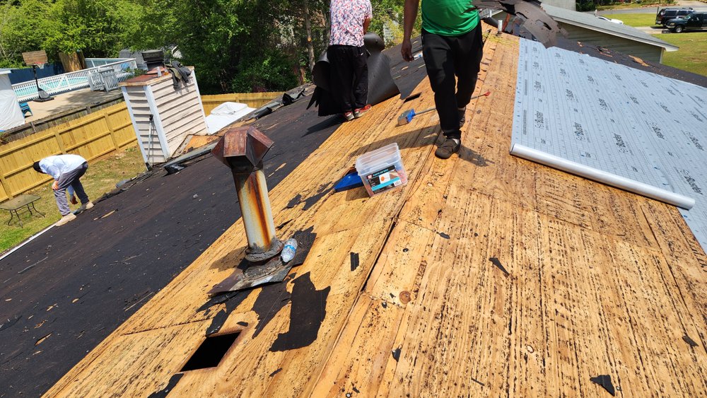 Slide of JS Roofing Group