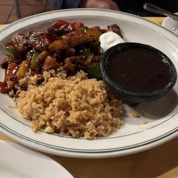 Tropical pork, plantains, black beans and rice