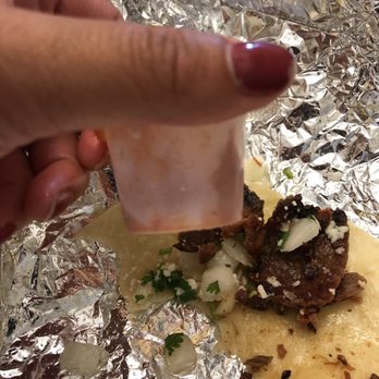 Rusty Taco - Full ramekin of sauce - Tex-Mex Near Me - Maple Grove, Minnesota Rusty Taco - Full ramekin of sauce - Tex-Mex Near Me - Maple Grove, Minnesota
