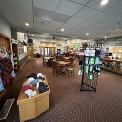 Flagg Creek Golf Course - Clubhouse. Nothing fancy but it's clean and spacious. Check in to the right, with the bar further away.