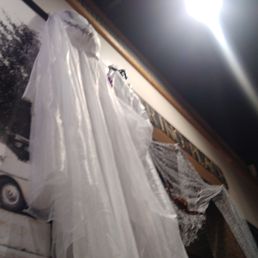 ows a ghost hanging on a wall
