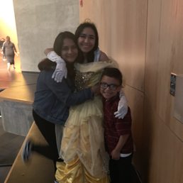 April Rodriguez as Belle