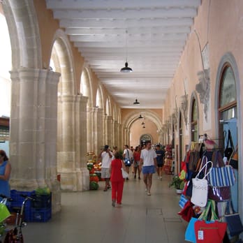 Mercado del Claustro - Old mercado stalls (wee hours of the morning, most not open yet, people at breakfast). - Shopping Near Me - Mao, PM