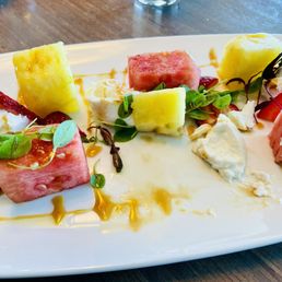 Summer salad. Buratta cheese sprinkled with honey. Yum! Summer salad. Buratta cheese sprinkled with honey. Yum!