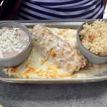 Don Quixote's Mexican Grill - Mom's enchilada lunch. I snagged some of the melted cheese! - Mexican Near Me - Rocklin, California Don Quixote's Mexican Grill - Mom's enchilada lunch. I snagged some of the melted cheese! - Mexican Near Me - Rocklin, California