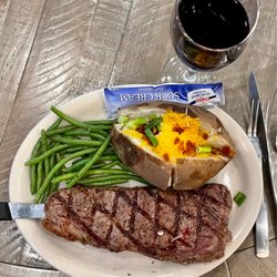 The Palm Room Bar & Grill - Steak dinner. Call ahead to reserve a seat.