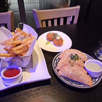 Mamajuana Cafe - Empanadas and oxtails croquetas. - Latin American Near Me - Houston, Texas
