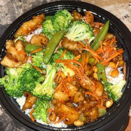 Kung Pao Chicken with white rice and I added broccoli to the dish. Kung Pao Chicken with white rice and I added broccoli to the dish.