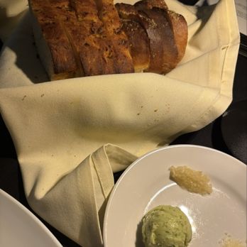 Avanzare Italian Dining - Homemade focaccia and French bread, I believe. Pesto butter plus side of garlic and Parmesan for olive oil and balsamic vinegar dipping. - Italian Near Me - Springfield, Missouri Avanzare Italian Dining - Homemade focaccia and French bread, I believe. Pesto butter plus side of garlic and Parmesan for olive oil and balsamic vinegar dipping. - Italian Near Me - Springfield, Missouri