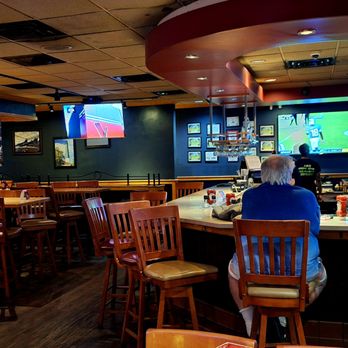 Applebee's Grill + Bar - This is a view of the interior from where seated and this photo was taken close to closing time - American Near Me - Pensacola, Florida Applebee's Grill + Bar - This is a view of the interior from where seated and this photo was taken close to closing time - American Near Me - Pensacola, Florida