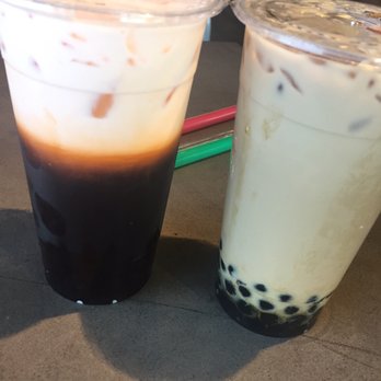 Pochi Bubble Tea Cafe - Thai tea on the left and lavender milk tea on the right - Bubble Tea Near Me - Lynnwood, Washington Pochi Bubble Tea Cafe - Thai tea on the left and lavender milk tea on the right - Bubble Tea Near Me - Lynnwood, Washington