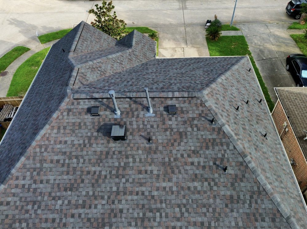 Slide of Noble Roofing