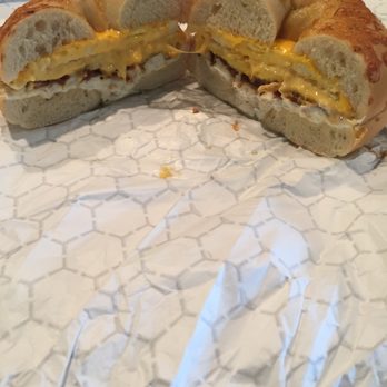Bite a Bagel - A look inside the Ghost Pepper Bagel with bacon, egg, cheese, and Bacon Chive Cream Cheese. - Bagels Near Me - St. Augustine, Florida