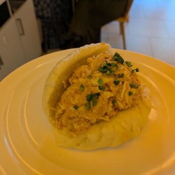 Papa d’Amour - @endoedibles on Instagram 09/05/26 EGG & TOMATO BREAKFAST BAO - scrambled eggs, blistered tomato, rice vermicelli, steamed croissant bao - Bakeries Near Me - New York, New York
