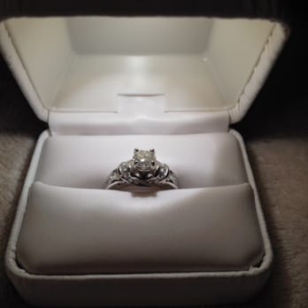 Georgetown Jewelry - These are pictures of the finished product. First in the light up box and then on her finger! - Jewelry Repair Near Me - Georgetown, Texas