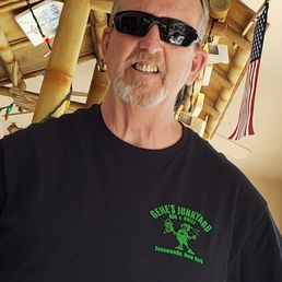 a man wearing sunglasses a man wearing sunglasses