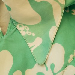 Mercy Vintage - What appears to be fade from water damage on the left front collar in natural light.