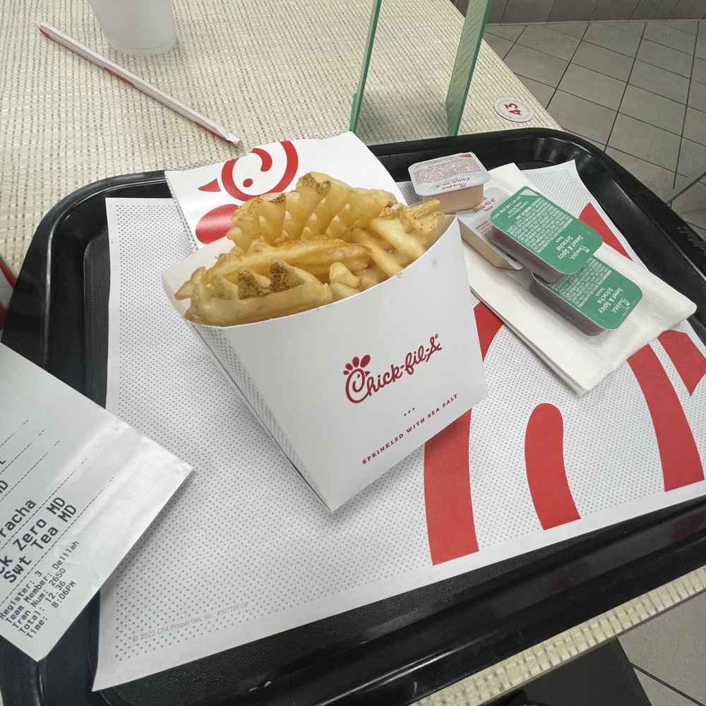 Chick-fil-A - ows a tray of fries and a drink - Fast Food Near Me - Baytown, Texas