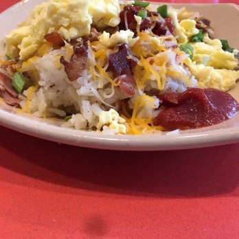 Snooze, an A.M. Eatery - Snooze deluxe hash browns with bacon and prosciutto. Minus a few bites because it looked and is soooo good - Breakfast & Brunch Near Me - Katy, Texas Snooze, an A.M. Eatery - Snooze deluxe hash browns with bacon and prosciutto. Minus a few bites because it looked and is soooo good - Breakfast & Brunch Near Me - Katy, Texas