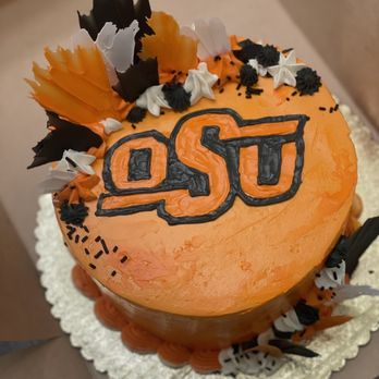 Quincy Bake Shop - European icing, with white chocolate decorations - Bakeries Near Me - Oklahoma City, Oklahoma