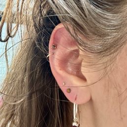 They changed out my 2nd and 3rd piercings, as well as both cartilage piercings. They changed out my 2nd and 3rd piercings, as well as both cartilage piercings.
