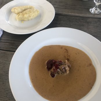Kuchyň - Pork with cranberry and a cream sauce, and soft potato dumplings. - Czech Near Me - Praha 1, Puerto Rico Kuchyň - Pork with cranberry and a cream sauce, and soft potato dumplings. - Czech Near Me - Praha 1, Puerto Rico