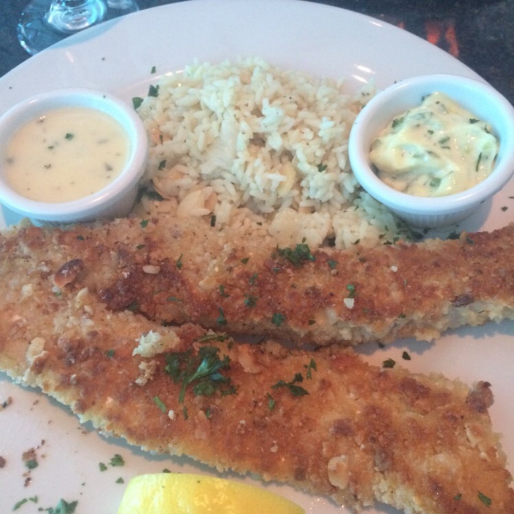 Lighthouse Restaurant - Macedonia crusted walleye with garlic, almond rice. - Seafood Near Me - Cedar Lake, Indiana Lighthouse Restaurant - Macedonia crusted walleye with garlic, almond rice. - Seafood Near Me - Cedar Lake, Indiana