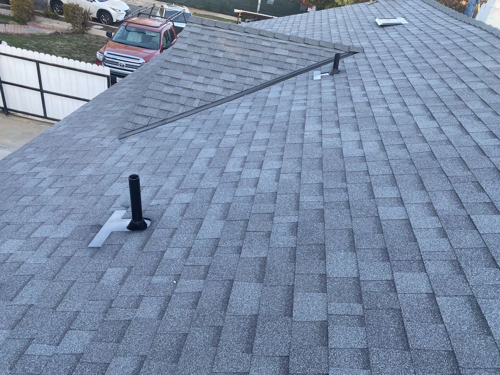 Slide of Henala Roofing