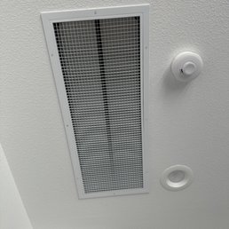 The fan itself is behind this grate, on the ceiling at the top of the stairs. Very subtle, considering we got the largest size fan. The fan itself is behind this grate, on the ceiling at the top of the stairs. Very subtle, considering we got the largest size fan.