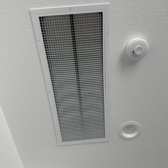 Selsor Electric - The fan itself is behind this grate, on the ceiling at the top of the stairs. Very subtle, considering we got the largest size fan. - Electricians Near Me - Fresno, California Selsor Electric - The fan itself is behind this grate, on the ceiling at the top of the stairs. Very subtle, considering we got the largest size fan. - Electricians Near Me - Fresno, California