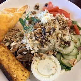 Mediterranean bowl with tofu, crab Rangoon and corn bread. Mediterranean bowl with tofu, crab Rangoon and corn bread.