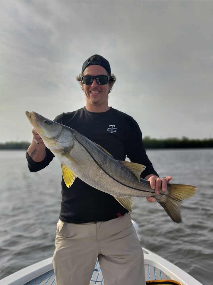Whatever Turns U On Fishing Charters Logo