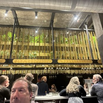 Golden Hour - I didn't like the decor. The gold chains hanging from the ceiling were tacking and the acoustics very noisy - Bars Near Me - Asheville, North Carolina Golden Hour - I didn't like the decor. The gold chains hanging from the ceiling were tacking and the acoustics very noisy - Bars Near Me - Asheville, North Carolina