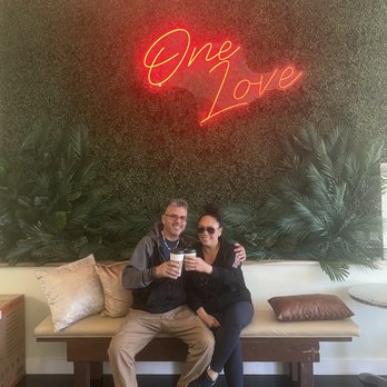 One Love Cafe - Two coffee lovers enjoying our new cafe - Coffee & Tea Near Me - San Bruno, California One Love Cafe - Two coffee lovers enjoying our new cafe - Coffee & Tea Near Me - San Bruno, California