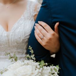 Bride wedding ring and flowers.