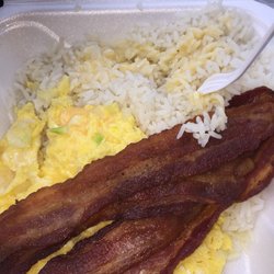 Scrambled Eggs with Cheese and onion, bacon and rice!