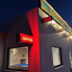 Lone Ranger RV Park & Lodge - Our office lobby & clubhouse is lit up by unique neon signs and has entertainment inside for our guests.