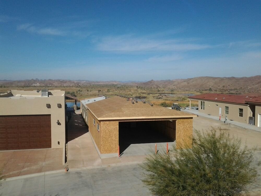 Slide of Outlaw Roofing