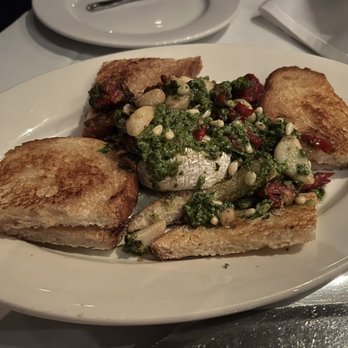 Dal Rae Restaurant - Underbaked Brie with undercooked garlic cloves - Steakhouses Near Me - Pico Rivera, California Dal Rae Restaurant - Underbaked Brie with undercooked garlic cloves - Steakhouses Near Me - Pico Rivera, California