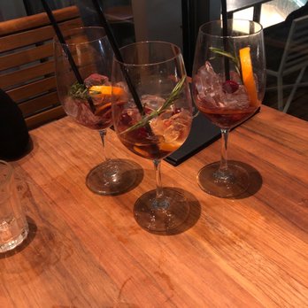 Earls Kitchen + Bar - Current drink of the month: delicious sangria! - New American Near Me - Orlando, Florida